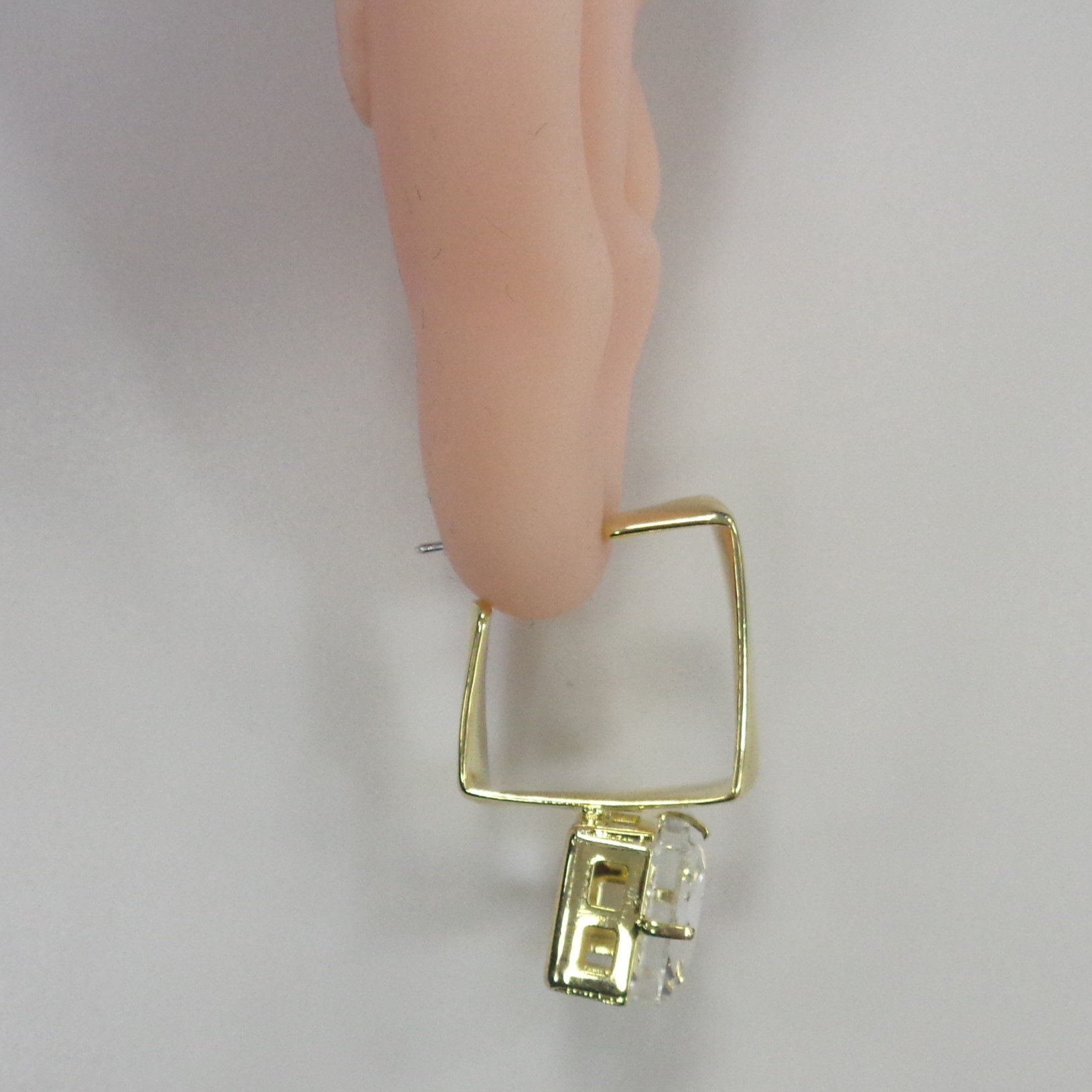 Серьги из бижутерного сплава желтого цвета; вставки 2 Ювелирное стекло бесцв.; Силикон;